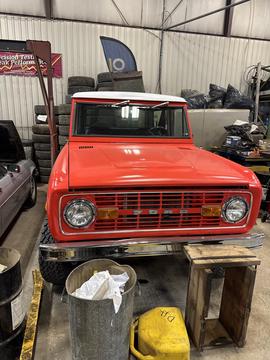 CashForCars USA | Classic Red Ford Bronco in Scrap Yard